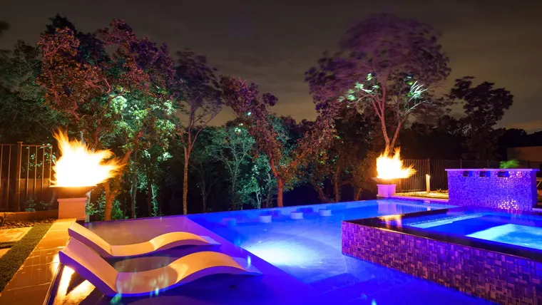 Landscape lighting by TC Lighting in Flower Mound, TX — photographed after dark on the property