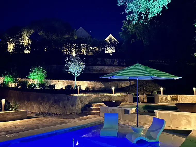 Landscape lighting by TC Lighting in Fort Worth, TX — photographed after dark on the property