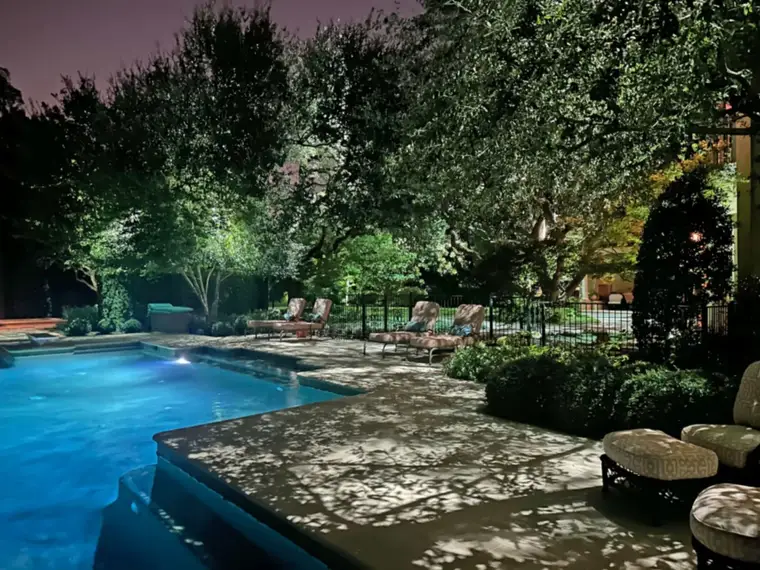 Landscape lighting by TC Lighting in Preston Hollow, Dallas &mdash; photographed after dark on the property