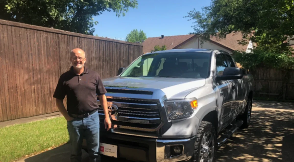 Todd Cormier, owner of TC Lighting, LLC, beside his work truck &mdash; a licensed Texas electrical contractor (TECL 41495) designing landscape lighting across the Dallas&ndash;Fort Worth Metroplex